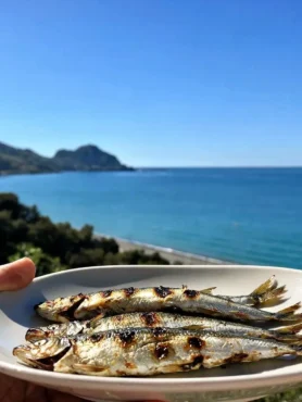 Alici alla griglia con salmoriglio leggero vista mare a Cefalù