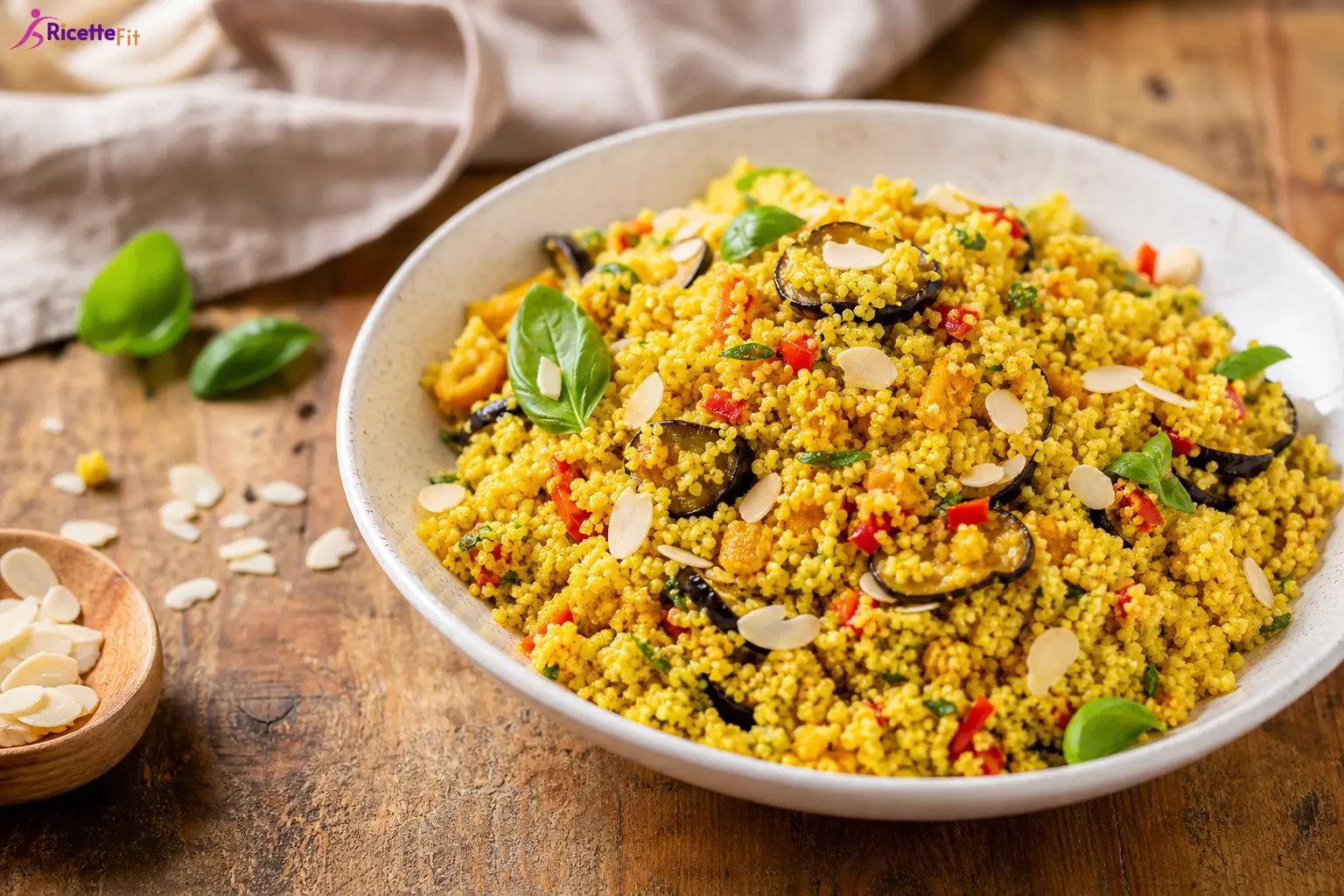 Couscous alle verdure con curcuma, basilico e mandorle
