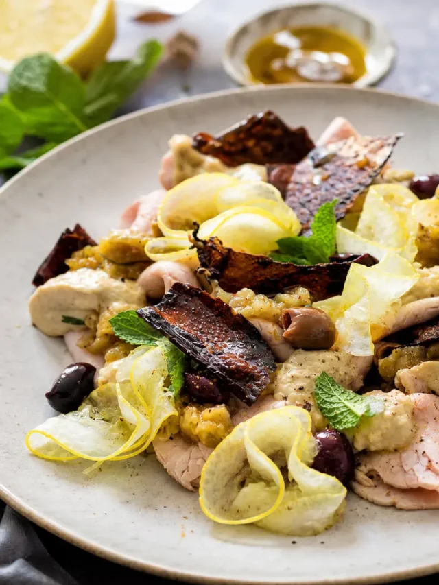 Arrosto freddo di vitello con melanzane, tahina, limone, menta e olive taggiasche