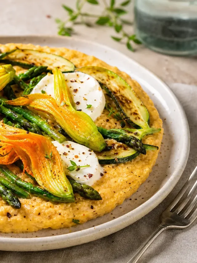 Frittata soffiata con asparagi, zucchine, fiori di zucca e formaggio di capra